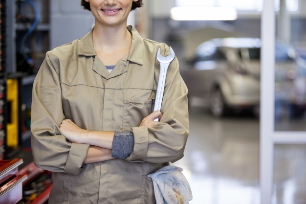 female-mechanic-with-arms-crossed-and-spanner_1170-1467